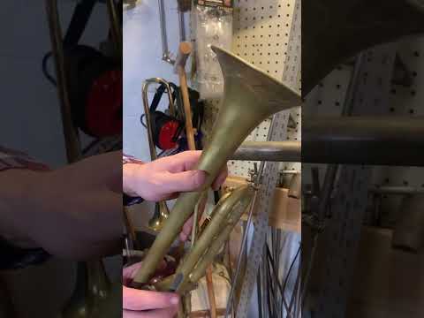 Dent repair practice, feat. a crushed trumpet bell…